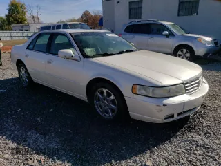 2002 Cadillac Seville Touring STS z VIN 1G6KY54922U151685, wystawiony jako Copart lot #78251854 z przebiegiem Nie podano mil oraz Szkoda całkowita • Salvage title. Historia ofert i sprzedaży dostępna na DreamBid. Obrazek 4.