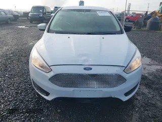 2018 Ford Focus SE with VIN 1FADP3F23JL242066, listed as a IAAI auction lot 41804512 with 99,662 mi miles. Bid and sale history available at carsss.com. Image 12.