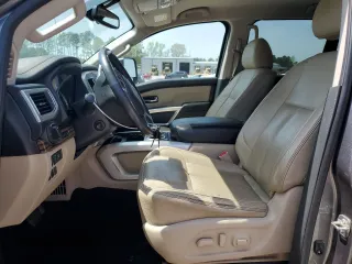 2017 Nissan Titan SL z VIN 1N6BA1F49HN514463, wystawiony jako Copart lot #51046805 z przebiegiem 99 686 mil mil oraz Szkody całkowita. Historia ofert i sprzedaży dostępna na DreamBid. Obrazek 7.