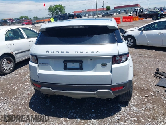 2015 Land Rover Range Rover Evoque Pure Premium z VIN SALVR2BG2FH075464, wystawiony jako IAAI lot #42268278 z przebiegiem 135 426 mil mil oraz . Historia ofert i sprzedaży dostępna na DreamBid. Obrazek 17.