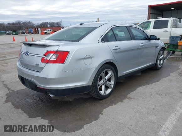 2012 Ford Taurus SHO z VIN 1FAHP2KT6CG142954, wystawiony jako IAAI lot #41526760 z przebiegiem 187 887 mil mil oraz . Historia ofert i sprzedaży dostępna na DreamBid. Obrazek 4.