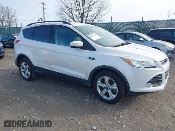 2014 Ford Escape SE with VIN 1FMCU0GX1EUB23743, listed as a IAAI auction lot 40893420 with 74,506 mi miles. Bid and sale history available at carsss.com. Image 1.
