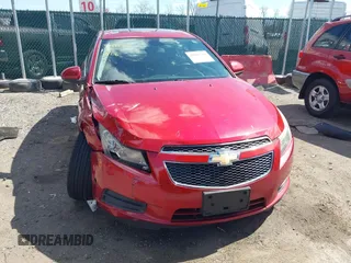 2014 Chevrolet Cruze 2LT z VIN 1G1PE5SB2E7123236, wystawiony jako IAAI lot #41882768 z przebiegiem 123 311 mil mil oraz . Historia ofert i sprzedaży dostępna na DreamBid. Obrazek 12.