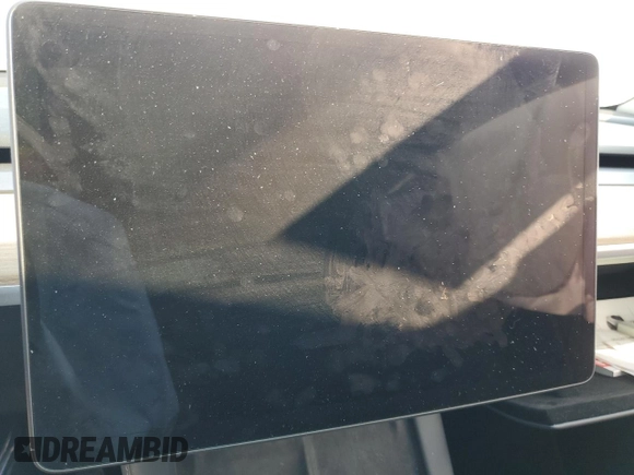 2023 Tesla Model Y Long Range with VIN 7SAYGDEE6PA053274, listed as a Copart auction lot 52865175 with Not Provided miles and Salvage Title. Bid and sale history available at DreamBid. Image 9.