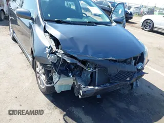 2009 Toyota Corolla with VIN 1NXBU40E69Z034459, listed as a IAAI auction lot 42095649 with 173,296 mi miles. Bid and sale history available at carsss.com. Image 6.