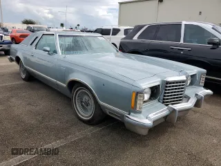 1977 Ford Thunderbird z VIN 7G87S303225, wystawiony jako Copart lot #74216404 z przebiegiem 48 305 mil mil oraz Szkody całkowita. Historia ofert i sprzedaży dostępna na DreamBid. Obrazek 4.