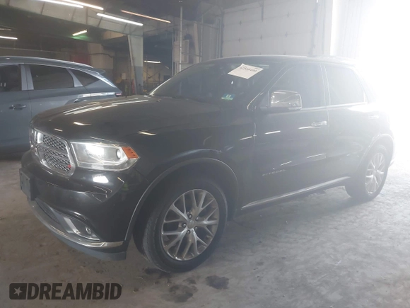 2014 Dodge Durango Citadel with VIN 1C4RDJEG1EC466162, listed as a IAAI auction lot 42560400 with 154,628 mi miles and . Bid and sale history available at DreamBid. Image 17.