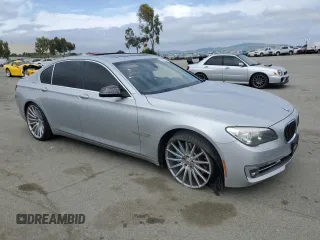 2013 BMW 7 Series 750i with VIN WBAYA8C57DC996498, listed as a Copart auction lot 52907415 with 109,405 mi miles and Salvage Title. Bid and sale history available at DreamBid. Image 4.