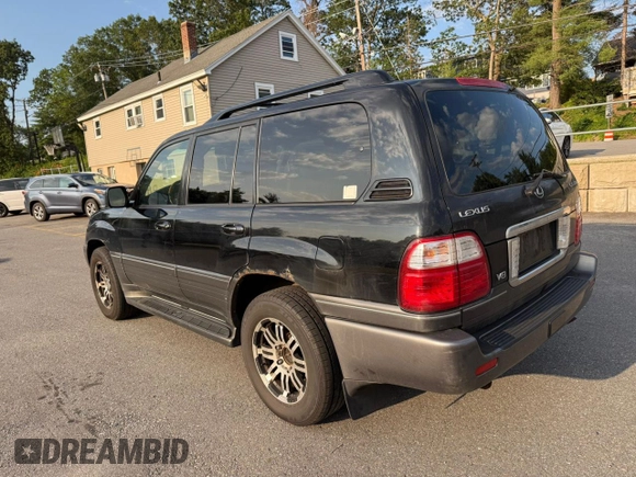 2004 Lexus LX 470 with VIN JTJHT00W44354386, listed as a Copart auction lot 63816455 with 389,442 mi miles and Clean title. Bid and sale history available at DreamBid. Image 3.