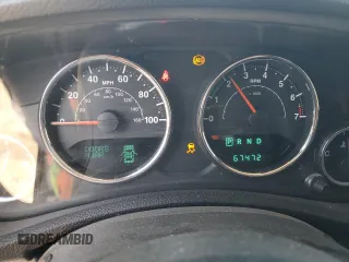 2014 Jeep Wrangler Unlimited Sport with VIN 1C4BJWDG8EL207287, listed as a Copart auction lot 49522335 with 67,472 mi miles and Salvage Title. Bid and sale history available at carsss.com. Image 9.