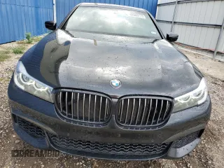 2019 BMW 7 Series 740i with VIN WBA7E2C57KB217455, listed as a Copart auction lot 69580773 with 74,717 mi miles and . Bid and sale history available at DreamBid. Image 5.