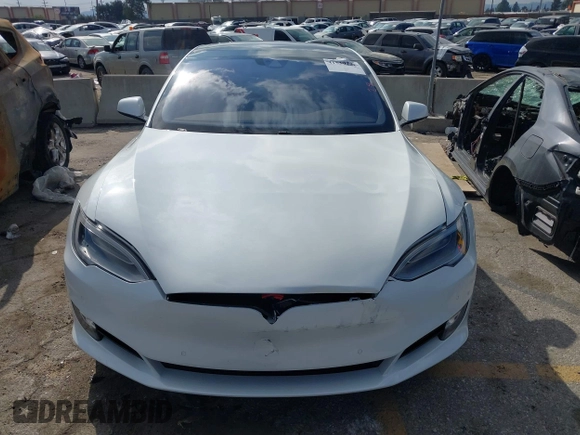 2016 Tesla Model S 90D with VIN 5YJSA1E27GF153525, listed as a IAAI auction lot 41539221 with 145,771 mi miles and . Bid and sale history available at DreamBid. Image 12.