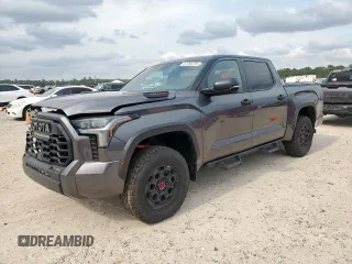 2024 Toyota Tundra TRD Pro Hybrid with VIN 5TFPC5DB2RX051180, listed as a Copart auction lot 57764735 with 28,956 mi miles and Salvage title. Bid and sale history available at DreamBid. Image 1.