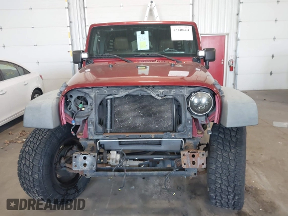 2011 Jeep Wrangler Unlimited Rubicon with VIN 1J4BA6H18BL584486, listed as a IAAI auction lot 42340661 with 152,896 mi miles and . Bid and sale history available at DreamBid. Image 12.