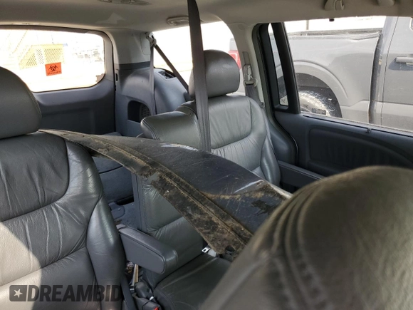 2005 Honda Odyssey EX-L z VIN 5FNRL38685B092279, wystawiony jako Copart lot #57452175 z przebiegiem Nie podano mil oraz Szkoda całkowita • Salvage title. Historia ofert i sprzedaży dostępna na DreamBid. Obrazek 10.