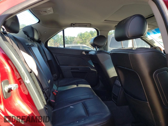 2009 Cadillac STS AWD z VIN 1G6DD67VX90138316, wystawiony jako Copart lot #80915524 z przebiegiem 112 290 mil mil oraz Czysty tytuł • Clean title. Historia ofert i sprzedaży dostępna na DreamBid. Obrazek 10.