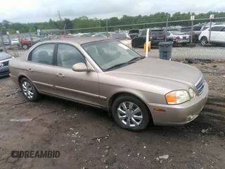 2004 Kia Optima LX z VIN KNAGD126145341553, wystawiony jako IAAI lot #42125080 z przebiegiem Nie podano mil oraz . Historia ofert i sprzedaży dostępna na DreamBid. Obrazek 1.