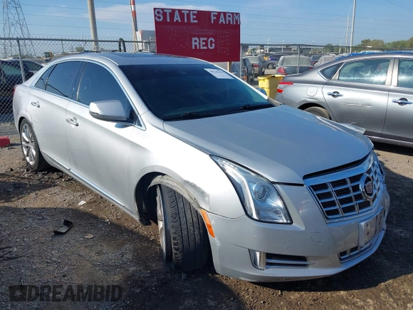 2013 Cadillac XTS Premium z VIN 2G61S5S30D9184910, wystawiony jako IAAI lot #40220419 z przebiegiem 111 330 mil mil oraz . Historia ofert i sprzedaży dostępna na DreamBid. Obrazek 1.