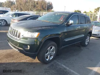 2011 Jeep Grand Cherokee Limited with VIN 1J4RR5GT8BC628653, listed as a IAAI auction lot 41428174 with 59,579 mi miles. Bid and sale history available at carsss.com. Image 17.