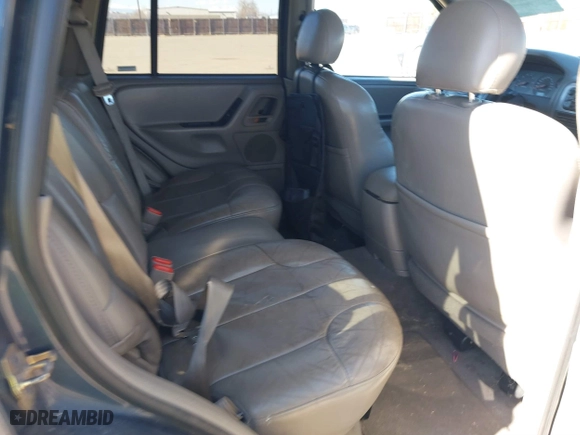 2001 Jeep Grand Cherokee Laredo with VIN 1J4GW48N11C558857, listed as a IAAI auction lot 41527331 with 187,513 mi miles. Bid and sale history available at carsss.com. Image 8.
