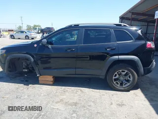 2019 Jeep Cherokee Trailhawk Elite with VIN 1C4PJMBX0KD198328, listed as a IAAI auction lot 42085194 with 76,312 mi miles and . Bid and sale history available at DreamBid. Image 15.