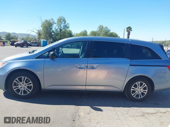 2012 Honda Odyssey EX-L with VIN 5FNRL5H69CB003067, listed as a IAAI auction lot 41862591 with 163,158 mi miles and . Bid and sale history available at carsss.com. Image 14.