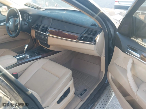 2011 BMW X5 35i with VIN 5UXZV4C54BL402935, listed as a IAAI auction lot 41198827 with 120,157 mi miles. Bid and sale history available at carsss.com. Image 5.