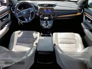 2018 Honda CR-V Touring with VIN 7FARW1H91JE026094, listed as a Copart auction lot 59942445 with 150,329 mi miles and Salvage title. Bid and sale history available at DreamBid. Image 8.