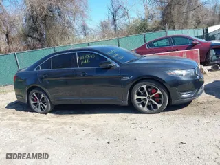 2014 Ford Taurus SHO with VIN 1FAHP2KT0EG164404, listed as a IAAI auction lot 41899695 with 157,077 mi miles. Bid and sale history available at carsss.com. Image 14.