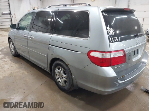 2006 Honda Odyssey EX with VIN 5FNRL38446B044231, listed as a IAAI auction lot 42080586 with 211,908 mi miles. Bid and sale history available at carsss.com. Image 3.
