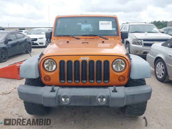 2011 Jeep Wrangler Sport with VIN 1J4AA2D1XBL579882, listed as a IAAI auction lot 42122353 with 153,885 mi miles and . Bid and sale history available at carsss.com. Image 12.