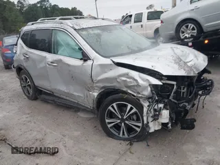 2017 Nissan Rogue SV with VIN JN8AT2MT7HW143178, listed as a IAAI auction lot 41015343 with 139,828 mi miles and . Bid and sale history available at DreamBid. Image 1.