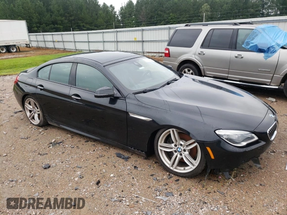 2017 BMW 6 Series 640i xDrive with VIN WBA6D2C58HGT66290, listed as a Copart auction lot 65738404 with 105,783 mi miles and Salvage Title. Bid and sale history available at carsss.com. Image 4.