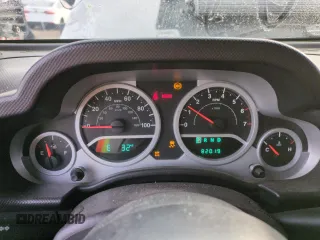 2007 Jeep Wrangler Rubicon z VIN 1J8GA64157L125319, wystawiony jako Copart lot #82929184 z przebiegiem 82 019 mil mil oraz Szkoda całkowita • Salvage title. Historia ofert i sprzedaży dostępna na DreamBid. Obrazek 9.