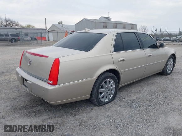 2009 Cadillac DTS w/1SA with VIN 1G6KD57Y29U137410, listed as a IAAI auction lot 42026044 with 112,916 mi miles. Bid and sale history available at carsss.com. Image 4.