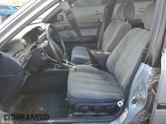 1990 Toyota Camry DLX z VIN 4T1SV21E8LU165609, wystawiony jako Copart lot #79314534 z przebiegiem 153 006 mil mil oraz Szkoda całkowita • Salvage title. Historia ofert i sprzedaży dostępna na DreamBid. Obrazek 7.