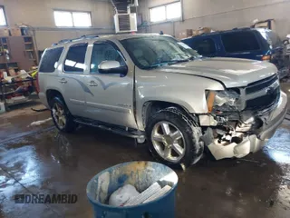 2009 Chevrolet Tahoe 1LT z VIN 1GNFK23069R179124, wystawiony jako IAAI lot #41578460 z przebiegiem 143 705 mil mil oraz . Historia ofert i sprzedaży dostępna na DreamBid. Obrazek 1.