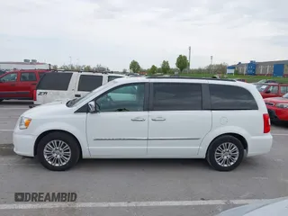 2015 Chrysler Town & Country Touring-L with VIN 2C4RC1CG9FR573863, listed as a IAAI auction lot 42036034 with 141,390 mi miles. Bid and sale history available at carsss.com. Image 14.