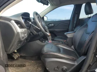 2014 Jeep Cherokee Trailhawk with VIN 1C4PJMBS9EW159993, listed as a Copart auction lot 46935105 with 128,140 mi miles and Salvage Title. Bid and sale history available at carsss.com. Image 7.