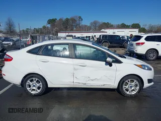2016 Ford Fiesta SE with VIN 3FADP4BJ3GM122262, listed as a IAAI auction lot 41760654 with 111,438 mi miles and . Bid and sale history available at DreamBid. Image 13.