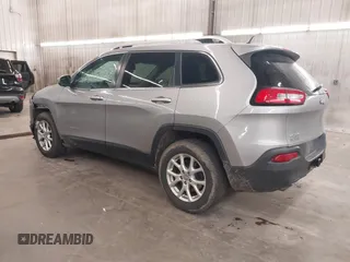 2014 Jeep Cherokee Altitude with VIN 1C4PJMCB9EW149754, listed as a IAAI auction lot 41983427 with 199,810 mi miles and . Bid and sale history available at DreamBid. Image 3.