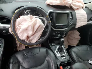 2015 Jeep Cherokee Trailhawk z VIN 1C4PJMBS7FW704980, wystawiony jako Copart lot #70334472 z przebiegiem 127 562 mil mil oraz Szkoda całkowita • Salvage title. Historia ofert i sprzedaży dostępna na DreamBid. Obrazek 8.