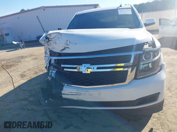 2015 Chevrolet Tahoe LT with VIN 1GNSCBKC0FR104096, listed as a IAAI auction lot 41679298 with 231,005 mi miles and . Bid and sale history available at DreamBid. Image 12.