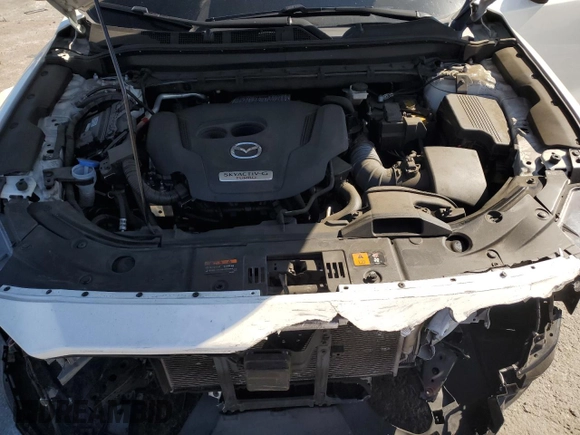 2022 Mazda CX-5 2.5 Turbo with VIN JM3KFBAY5N0525299, listed as a Copart auction lot 44736945 with 53,890 mi miles and Salvage Title. Bid and sale history available at carsss.com. Image 12.