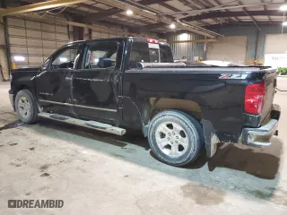 2014 Chevrolet Silverado 1500 LTZ with VIN 3GCUKSEC7EG137661, listed as a Copart auction lot 44549155 with 142,972 mi miles and Salvage Title. Bid and sale history available at carsss.com. Image 2.