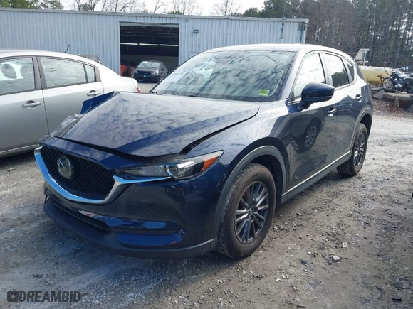 2020 Mazda CX-5 Touring with VIN JM3KFACM2L0789243, listed as a IAAI auction lot 41581191 with NaN miles. Bid and sale history available at carsss.com. Image 2.