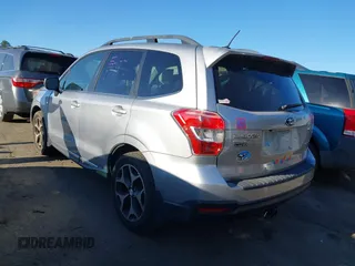 2015 Subaru Forester 2.0XT Touring with VIN JF2SJGWC7FH511989, listed as a IAAI auction lot 41888571 with 135,501 mi miles. Bid and sale history available at carsss.com. Image 3.