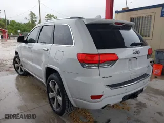2014 Jeep Grand Cherokee Overland with VIN 1C4RJFCT4EC337564, listed as a IAAI auction lot 41982886 with 191,412 mi miles. Bid and sale history available at carsss.com. Image 3.