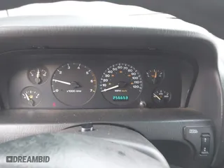 2003 Jeep Grand Cherokee Laredo with VIN 1J4GW48S93C583644, listed as a IAAI auction lot 41656314 with 256,653 mi miles. Bid and sale history available at carsss.com. Image 7.