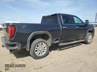 2020 GMC Sierra 2500HD Denali z VIN 1GT49REY7LF110457, wystawiony jako Copart lot #51105705 z przebiegiem 108 299 mil mil oraz Szkoda całkowita • Salvage title. Historia ofert i sprzedaży dostępna na DreamBid. Obrazek 3.